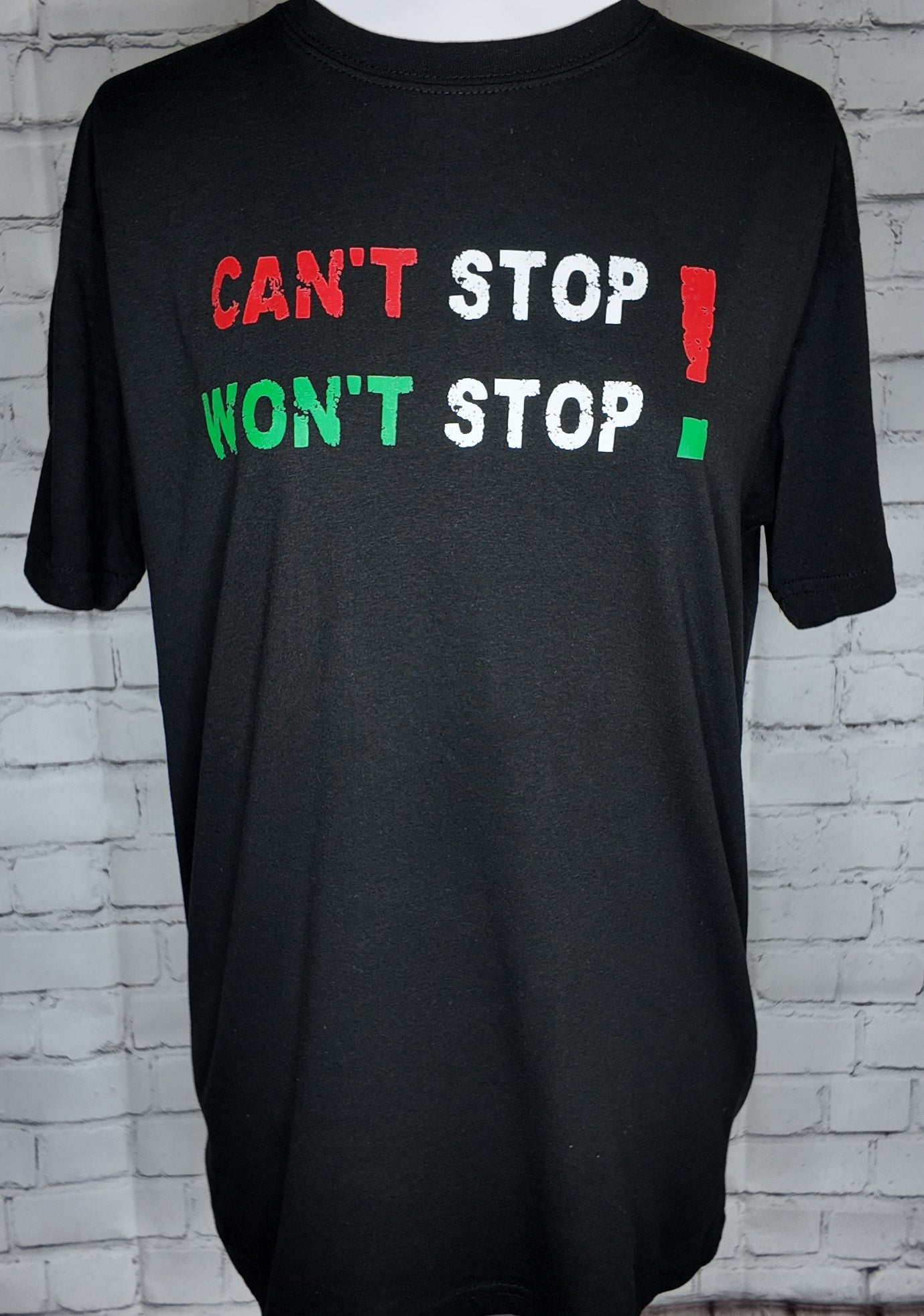 "Can't Stop Won't Stop" T-shirt with bold text design, front view