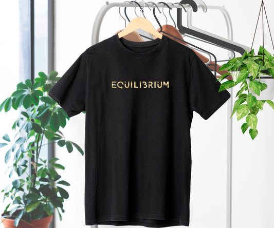 Black T-shirt with Equilibrium in gold script – centered design